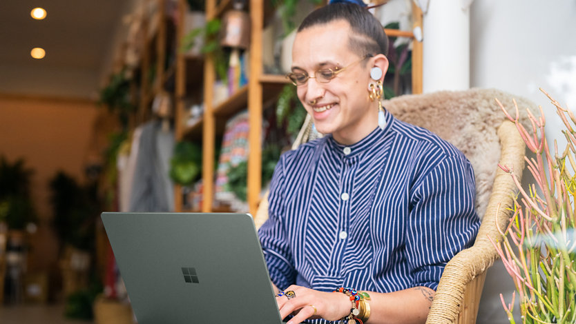 A student setting up their new Surface Laptop 5