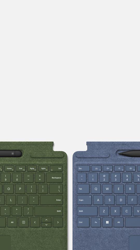 Top and the bottom of two keyboards that contain at least 12% renewable content.